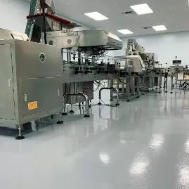 Pharmaceutical manufacturing facility with sanitary epoxy resin flooring