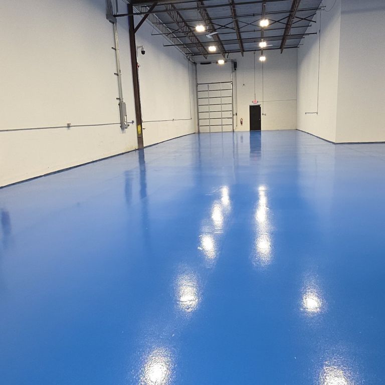 Heavy duty industrial warehouse epoxy flooring with high gloss finish in a Southern New Jersey distribution center.