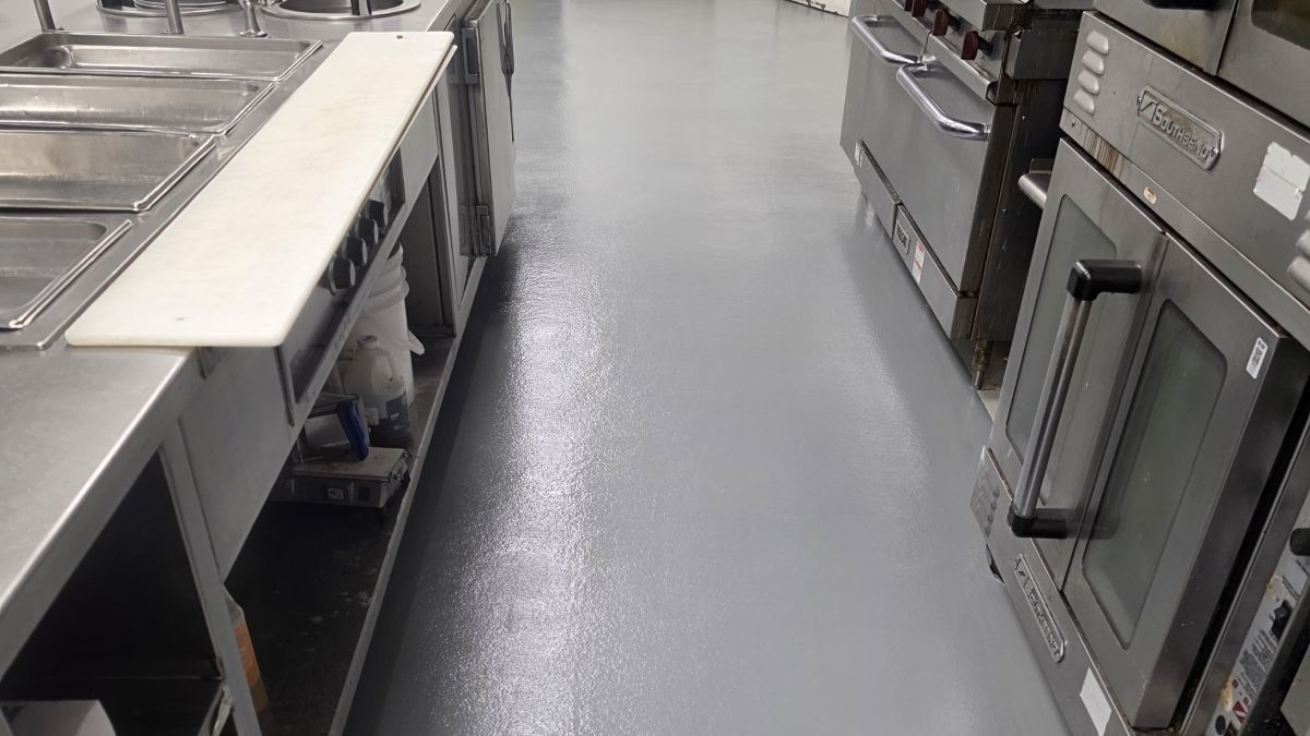Durable grey urethane cement kitchen flooring in a Princeton, NJ restaurant.