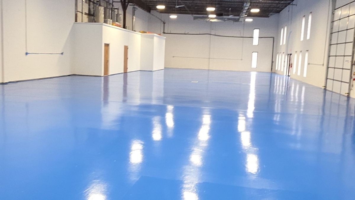 Heavy duty industrial warehouse epoxy flooring with high gloss finish in a Southern New Jersey distribution center.