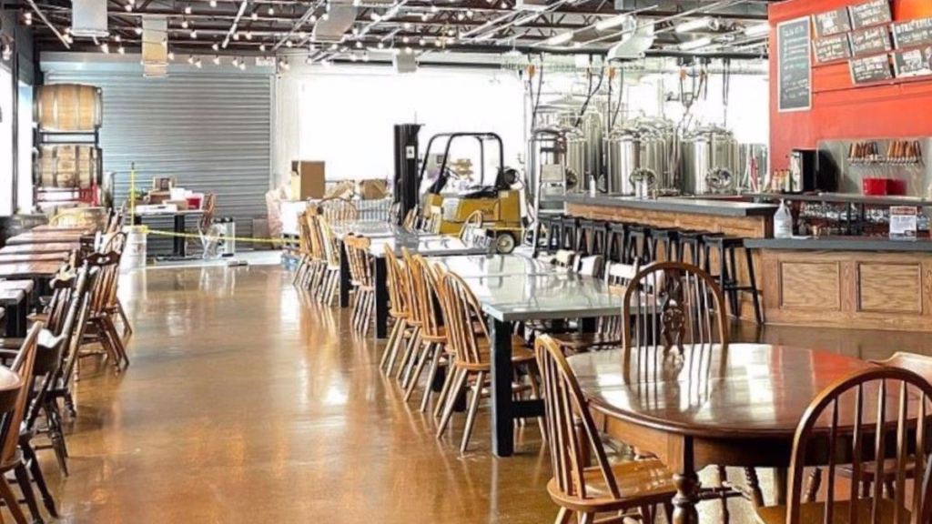 Commercial acid stained concrete flooring in a modern restaurant and bar dining area